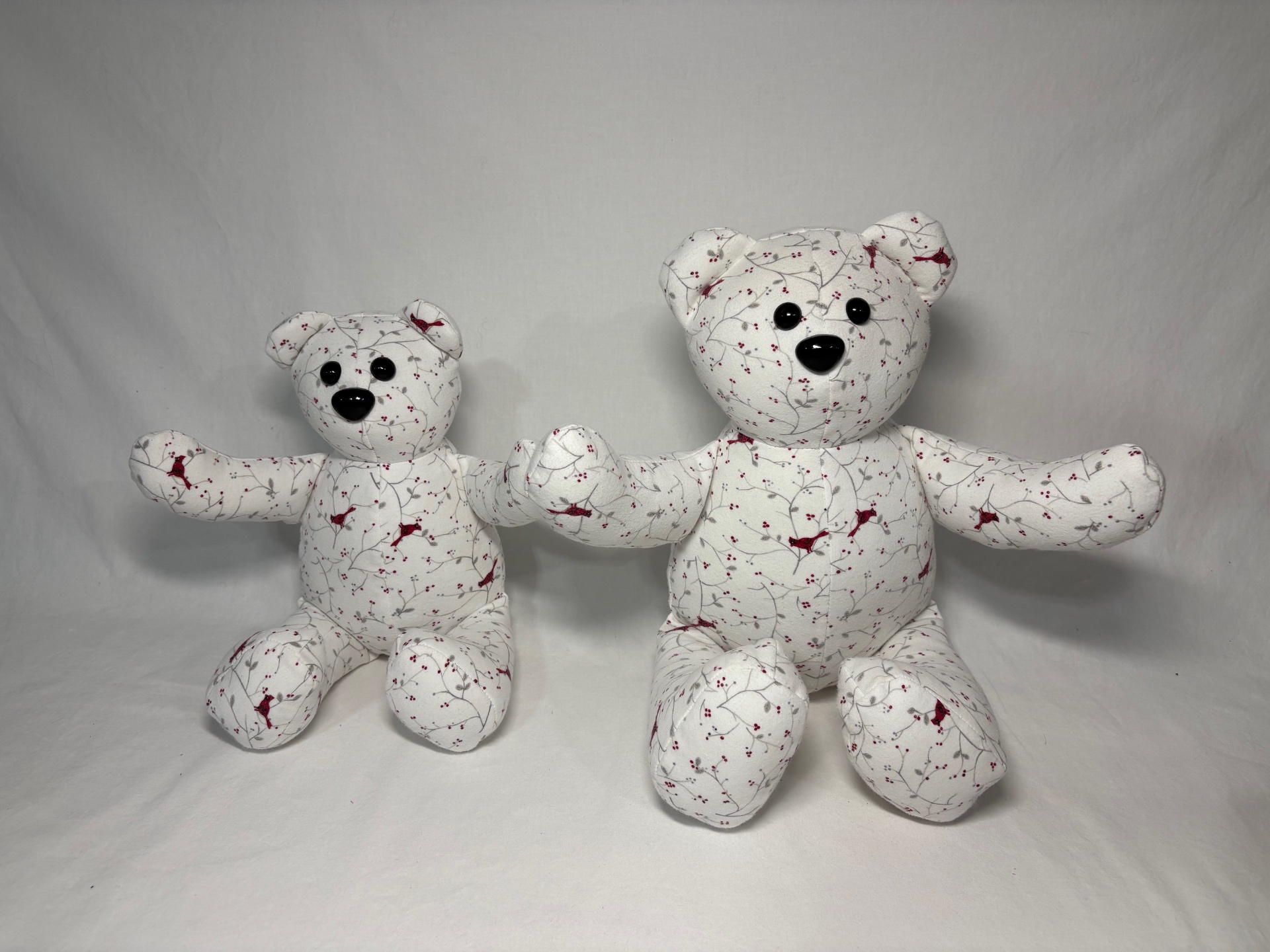 Matching pair of cardinal and berry print memory bears in two sizes