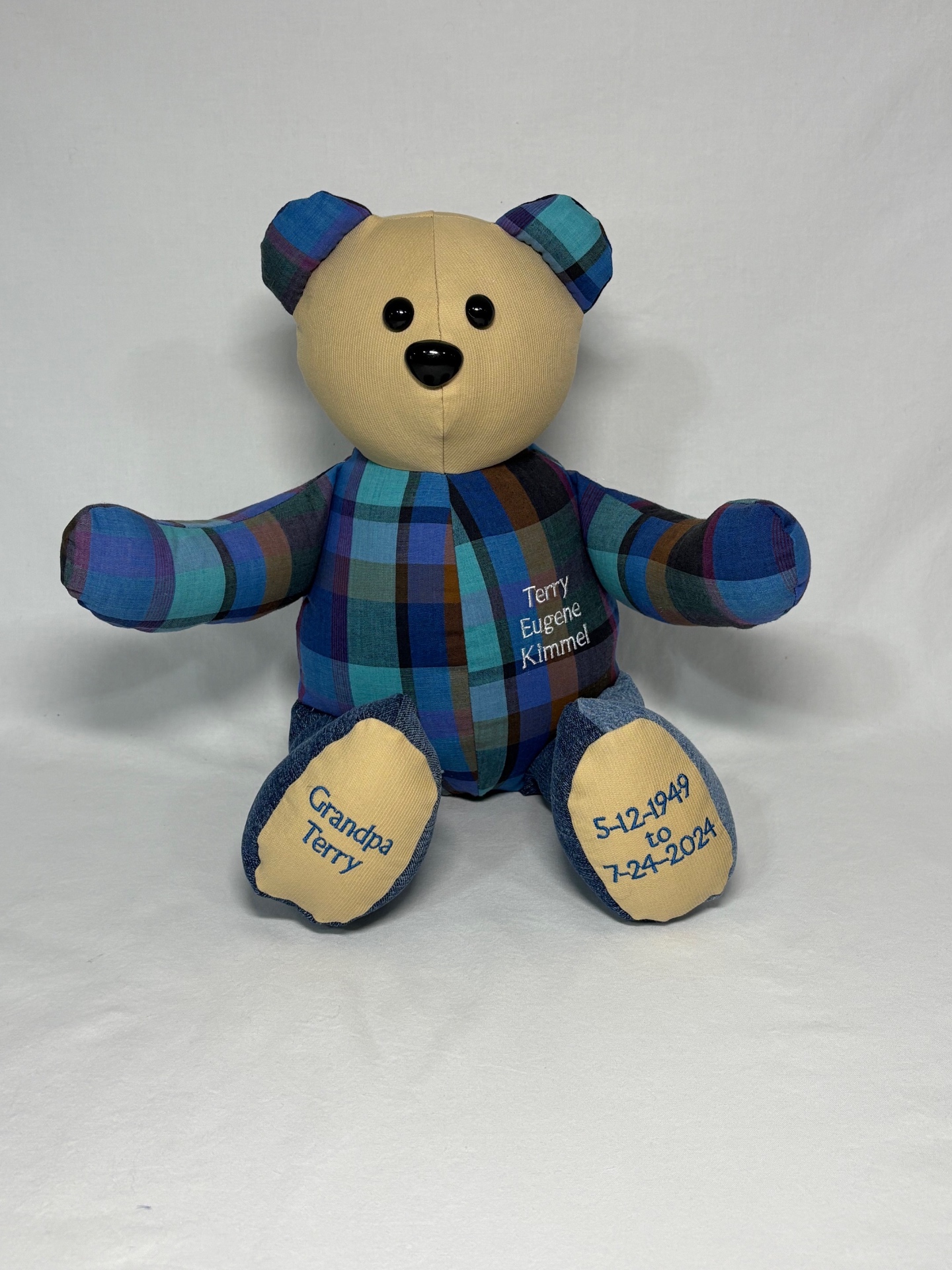 Terry Eugene Kimmel memory bear in bright blue plaid with denim feet and embroidered dates