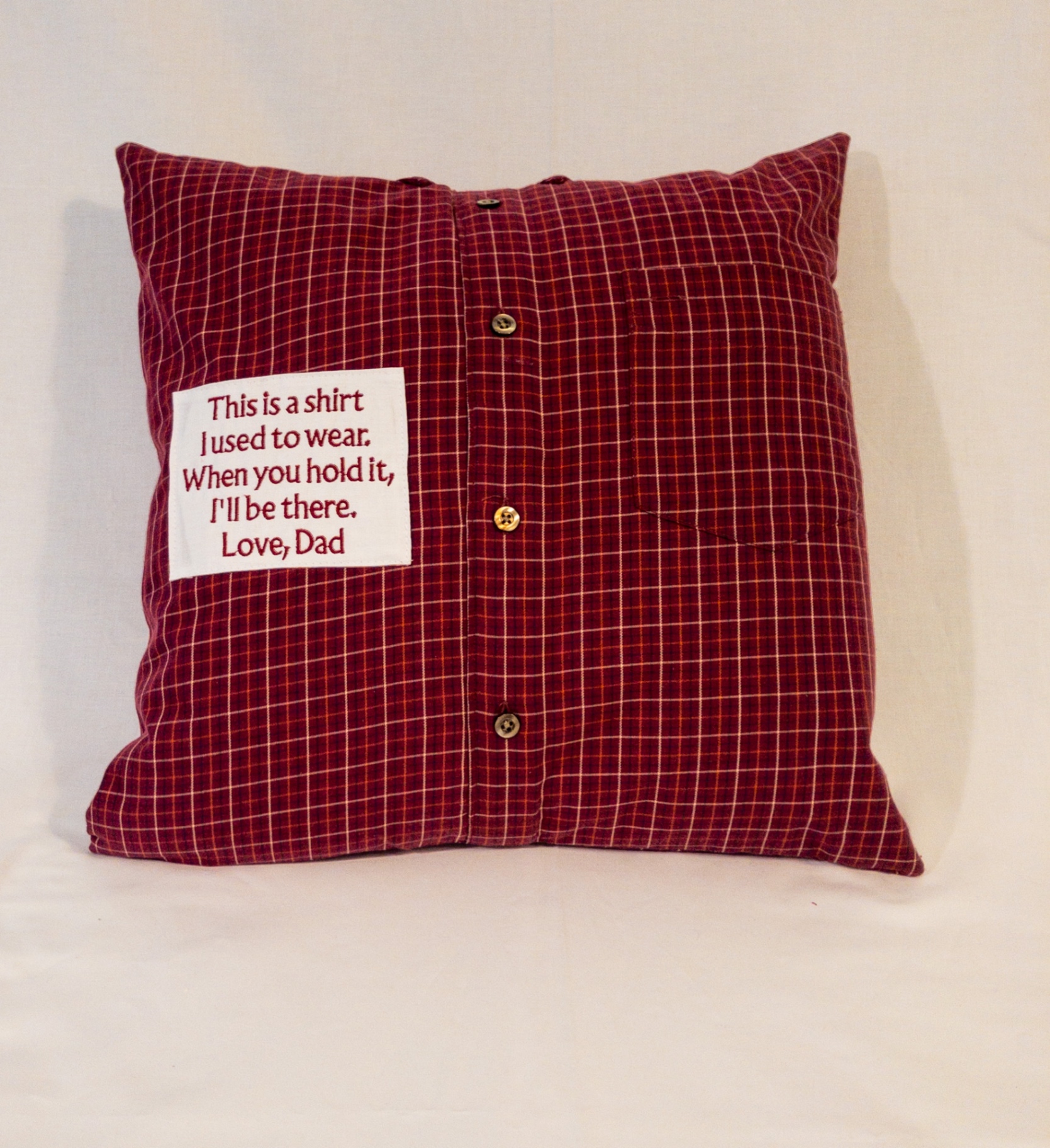 Burgundy windowpane button-down memory pillow with 'This is a shirt I used to wear — Love, Dad' embroidered patch
