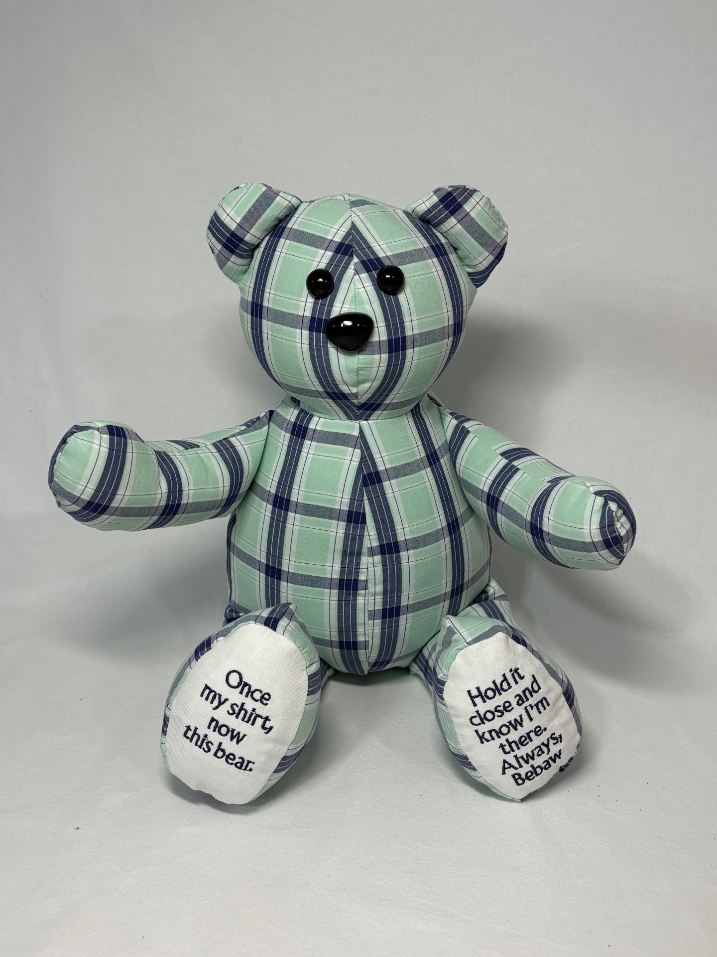 Mint green and navy plaid memory bear with love-note embroidered footpads