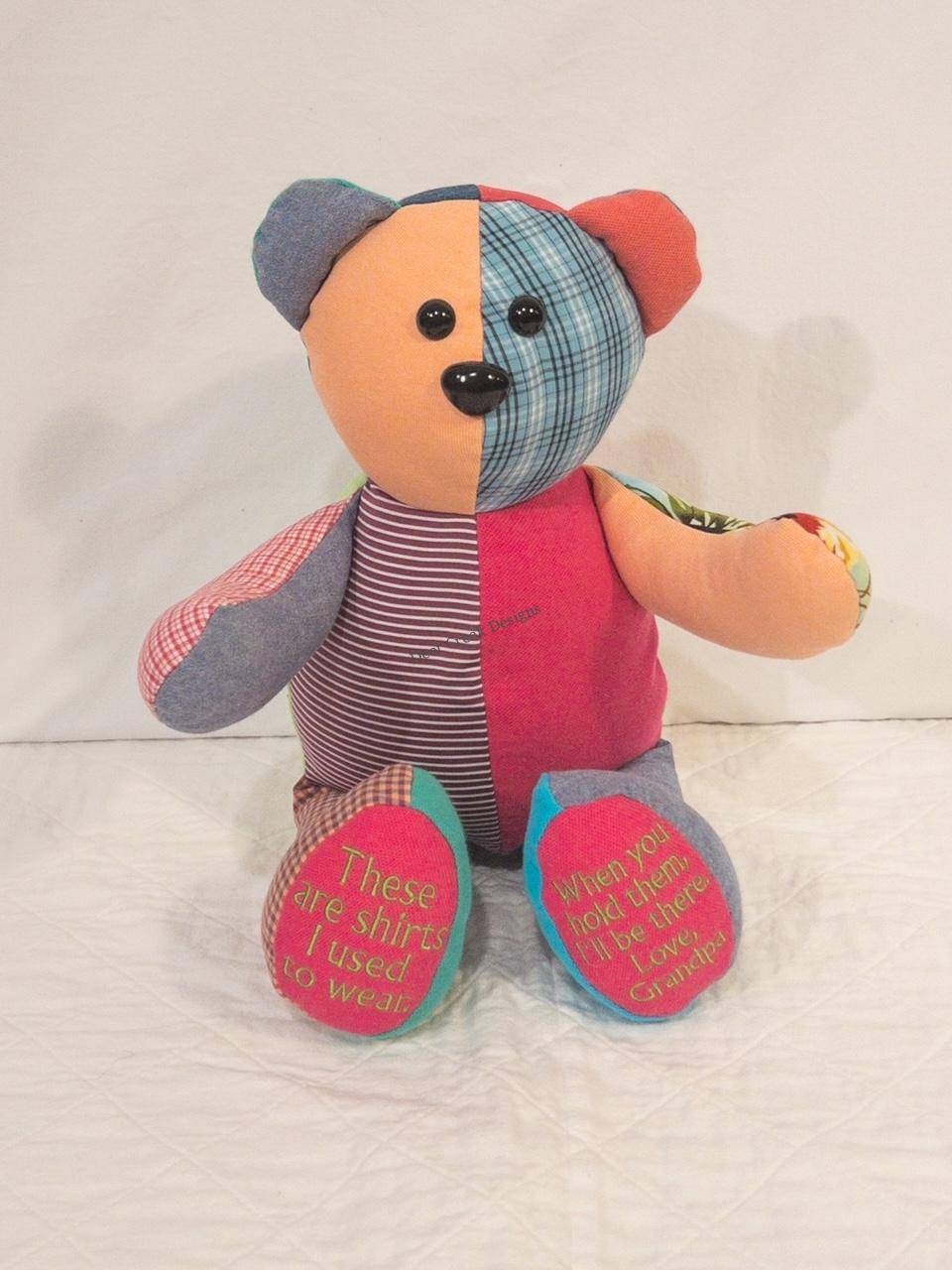 Bright patchwork memory bear from Grandpa's shirts with 'Love, Grandpa' embroidered on the feet