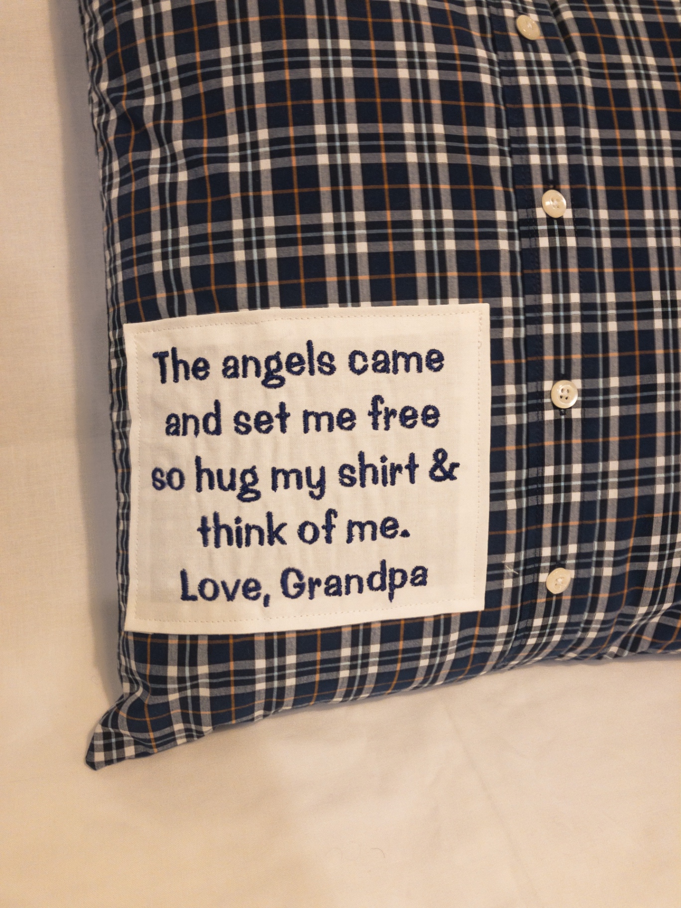 Navy plaid button-down memory pillow with 'The angels came and set me free — Love, Grandpa' embroidered patch