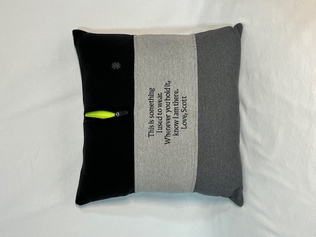 Black, gray, and charcoal color-block t-shirt memory pillow with 'This is something I used to wear — Love, Scott' embroidery
