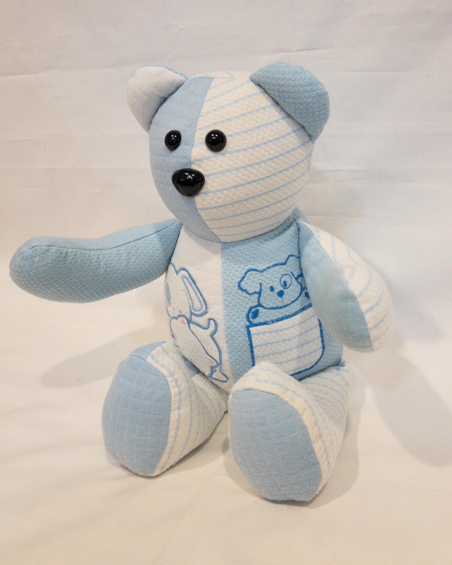 Soft blue and white baby memory bear made from newborn onesies with puppy embroidery