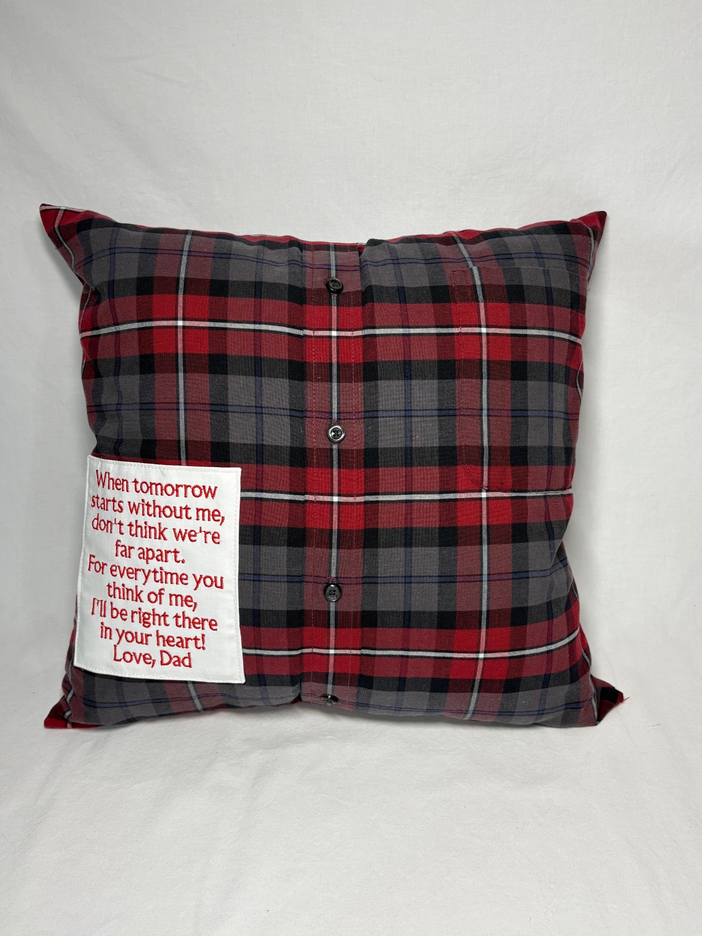 Red and gray plaid button-down memory pillow with 'When tomorrow starts without me — Love, Dad' embroidered patch